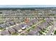 Charming home with a backyard patio nestled within a vibrant community with manicured lawns and nearby community pool at 7225 Ronnie Gardens Ct, Tampa, FL 33619