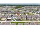 Wide aerial shot displaying the property's location, backyard patio, and community layout at 7225 Ronnie Gardens Ct, Tampa, FL 33619