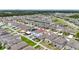 Aerial view showcasing the property's backyard patio and fire pit amenities at 7225 Ronnie Gardens Ct, Tampa, FL 33619