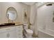 Bathroom featuring modern fixtures, a white vanity, and a tiled shower with curtain at 7225 Ronnie Gardens Ct, Tampa, FL 33619