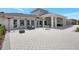 Spacious clubhouse boasts an open-air veranda with comfortable seating, ideal for relaxing and socializing with neighbors at 7225 Ronnie Gardens Ct, Tampa, FL 33619