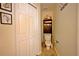 Functional bathroom features a toilet, storage cabinet, and neutral decor, creating a practical and tidy space at 759 Cape Cod Cir, Valrico, FL 33594