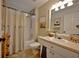 Clean bathroom features a vanity, shower-tub combo, and neutral decor, providing a practical and functional space at 759 Cape Cod Cir, Valrico, FL 33594