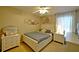 Bright bedroom showcases a bed, stylish furniture, and soft lighting, creating a cozy and inviting space at 759 Cape Cod Cir, Valrico, FL 33594