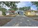 Charming home featuring a well-manicured front yard and a welcoming entrance at 759 Cape Cod Cir, Valrico, FL 33594