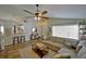 Spacious living room with vaulted ceiling, stylish furnishings, and an open layout at 759 Cape Cod Cir, Valrico, FL 33594