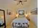 Beautifully decorated main bedroom features stylish furnishings, soft lighting, and tasteful artwork, offering a tranquil escape at 759 Cape Cod Cir, Valrico, FL 33594