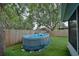 Backyard features a pool, enclosed by a wooden fence and lush landscaping at 759 Cape Cod Cir, Valrico, FL 33594