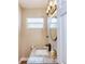 Updated bathroom with granite countertop, modern lighting, and sleek fixtures at 770 27Th S Ave, St Petersburg, FL 33705