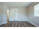 Bedroom with closet, window, hardwood floors, and freshly painted walls at 770 27Th S Ave, St Petersburg, FL 33705
