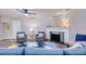 Comfortable living space with fireplace, stylish seating arrangement and a neutral color palette at 770 27Th S Ave, St Petersburg, FL 33705