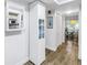 Hallway leading to eat-in kitchen with extra cabinet space at 7801 11Th N St # 104, St Petersburg, FL 33702