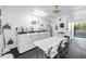 Bright laundry room features modern machines and a utility sink for added convenience at 7801 11Th N St # 104, St Petersburg, FL 33702