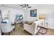 Inviting living area with comfortable seating, modern entertainment setup, and stylish decor at 7801 11Th N St # 104, St Petersburg, FL 33702