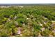 This property is surrounded by green trees, in a location convenient to nearby attractions at 7813 Cadillac Ave, Hudson, FL 34667