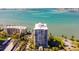 Aerial view of the high-rise condo with water views of the bay and waterfront at 80 Rogers St # 6D, Clearwater, FL 33756