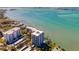 Beautiful waterfront condo with swimming pool, lush greenery, and stunning waterfront views at 80 Rogers St # 6D, Clearwater, FL 33756