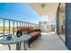 Comfortable outdoor seating on the balcony with city views and plenty of natural light at 80 Rogers St # 6D, Clearwater, FL 33756