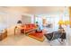 Bright living room with tiled floors, comfortable seating, and scenic views at 80 Rogers St # 6D, Clearwater, FL 33756