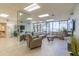 Elegant lobby area with comfortable seating, stylish decor, and large windows offering natural light at 80 Rogers St # 6D, Clearwater, FL 33756
