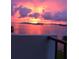 Beautiful sunset view from a balcony showcasing vibrant colors and the cityscape at 80 Rogers St # 6D, Clearwater, FL 33756