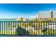Water view from balcony showcasing tranquil waters and local bridges in the distance at 80 Rogers St # 6D, Clearwater, FL 33756