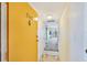Condo hallway leading to the main living area showcasing tile flooring and neutral walls at 8931 Blind Pass Rd # 262, St Pete Beach, FL 33706