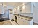 Kitchen features granite countertops, stainless steel appliances, and ample cabinet space at 8931 Blind Pass Rd # 262, St Pete Beach, FL 33706