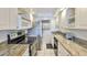 Kitchen features granite countertops, stainless steel appliances, and ample cabinet space at 8931 Blind Pass Rd # 262, St Pete Beach, FL 33706