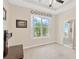 Bright and airy bedroom with ample natural light, neutral tones, and generous closet space at 9059 Spruce Creek Cir, Riverview, FL 33578