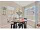 Cozy dining nook featuring a high-top table and a view to the outside at 9059 Spruce Creek Cir, Riverview, FL 33578