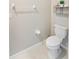 Cozy half-bathroom with tiled floor, modern fixtures, and neutral paint color at 9313 Lemon Drop Loop, Ruskin, FL 33573
