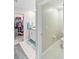 Bathroom featuring double sinks, walk-in closet, and separate toilet room at 9313 Lemon Drop Loop, Sun City Center, FL 33573