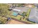 Aerial view of a fenced property with a pool and patio at 9930 121 N St, Seminole, FL 33772
