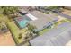 Aerial view of the property showcasing the pool, fenced backyard, and well-kept landscaping at 9930 121 N St, Seminole, FL 33772