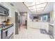 Bright kitchen featuring stainless appliances, ample counter space, and tile flooring at 9930 121 N St, Seminole, FL 33772