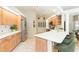 Kitchen bar overlooking light and bright kitchen with modern appliances and ample counter space at 10002 Colonnade Dr, Tampa, FL 33647
