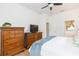 Spacious main bedroom featuring wood floors and traditional wooden furniture at 10002 Colonnade Dr, Tampa, FL 33647