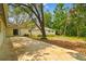 Exterior shot showcasing the backyard area, including a view of the connected home at 103 Hickory Creek Blvd, Brandon, FL 33511