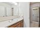 A bathroom featuring a vanity with mirror, a shower, and tile flooring at 103 Hickory Creek Blvd, Brandon, FL 33511