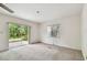 Spacious bedroom featuring a sliding glass door and plenty of light at 103 Hickory Creek Blvd, Brandon, FL 33511