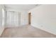 Bedroom with neutral carpet, large closet, and plenty of light at 103 Hickory Creek Blvd, Brandon, FL 33511