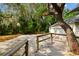 Concrete driveway featuring a basketball hoop, blending recreation with practicality at 103 Hickory Creek Blvd, Brandon, FL 33511