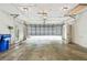 Spacious garage with an open door, offering ample parking and storage space at 103 Hickory Creek Blvd, Brandon, FL 33511