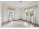 Living room featuring neutral carpet, white walls, and natural light at 103 Hickory Creek Blvd, Brandon, FL 33511