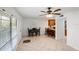 Bright dining area featuring tile floors, ceiling fan, and adjacent to the kitchen with lots of natural light at 108 Biscayne Ave # B, Tampa, FL 33606
