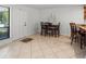 Bright dining area featuring tile floors, ceiling fan, and adjacent to the kitchen with lots of natural light at 108 Biscayne Ave # B, Tampa, FL 33606
