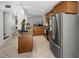 Large kitchen boasting granite countertops and modern appliances with breakfast bar and ample space for entertaining at 108 Biscayne Ave # B, Tampa, FL 33606