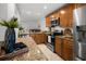 Updated kitchen with stainless steel appliances and granite counters, perfect for culinary enthusiasts at 108 Biscayne Ave # B, Tampa, FL 33606