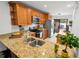 Well-appointed kitchen with granite countertops, stainless steel appliances, and ample cabinet space at 108 Biscayne Ave # B, Tampa, FL 33606